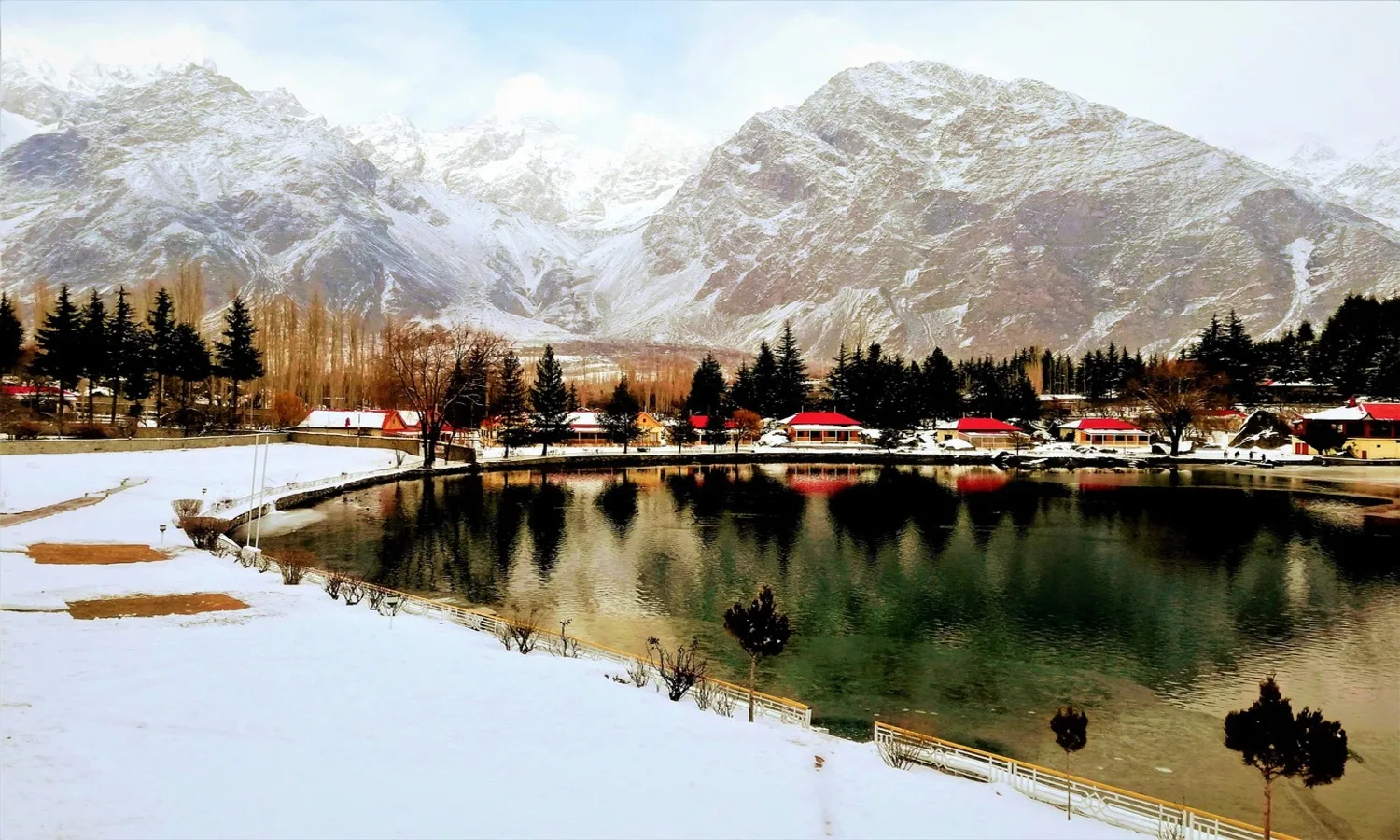 Skardu Valley Tour Package - 10 Days Gilgit Baltistan Adventure Kachura Lake’s turquoise waters framed by snow‑capped peaks at Shangrila, Skardu